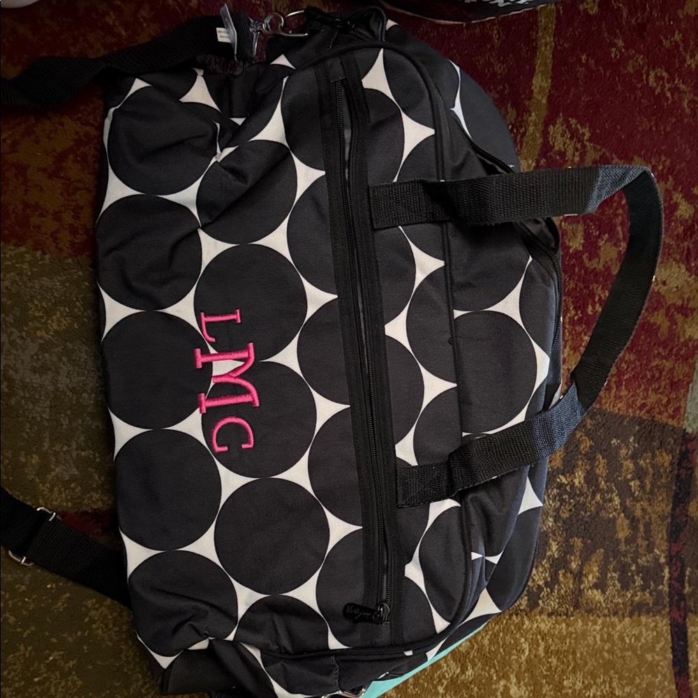 Stylish Black and White Polka Dot Thirty-one bag.